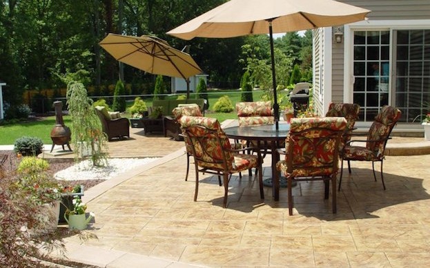 Stamped Concrete Patio with a Retaining Wall
